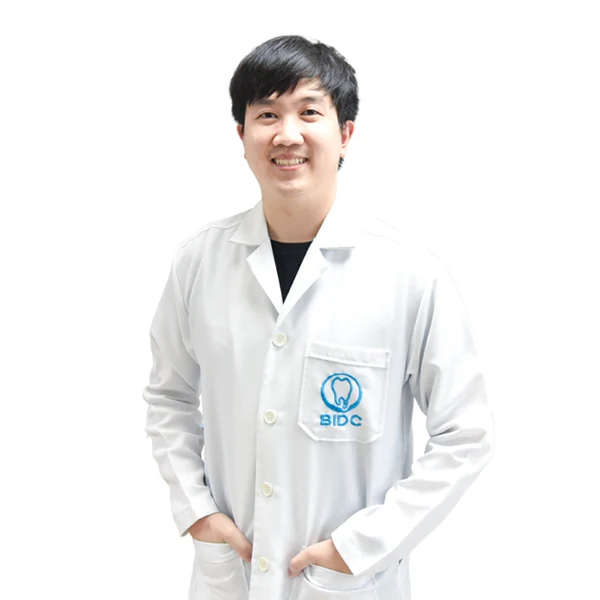 Dr. Gun Kraisittisirikul DDS.,